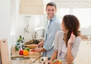 Man & woman preparing healthy food 