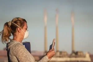 Woman living in a world with toxic pollution