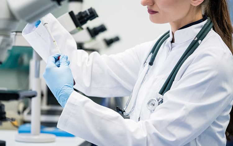 Doctor testing blood for toxicity